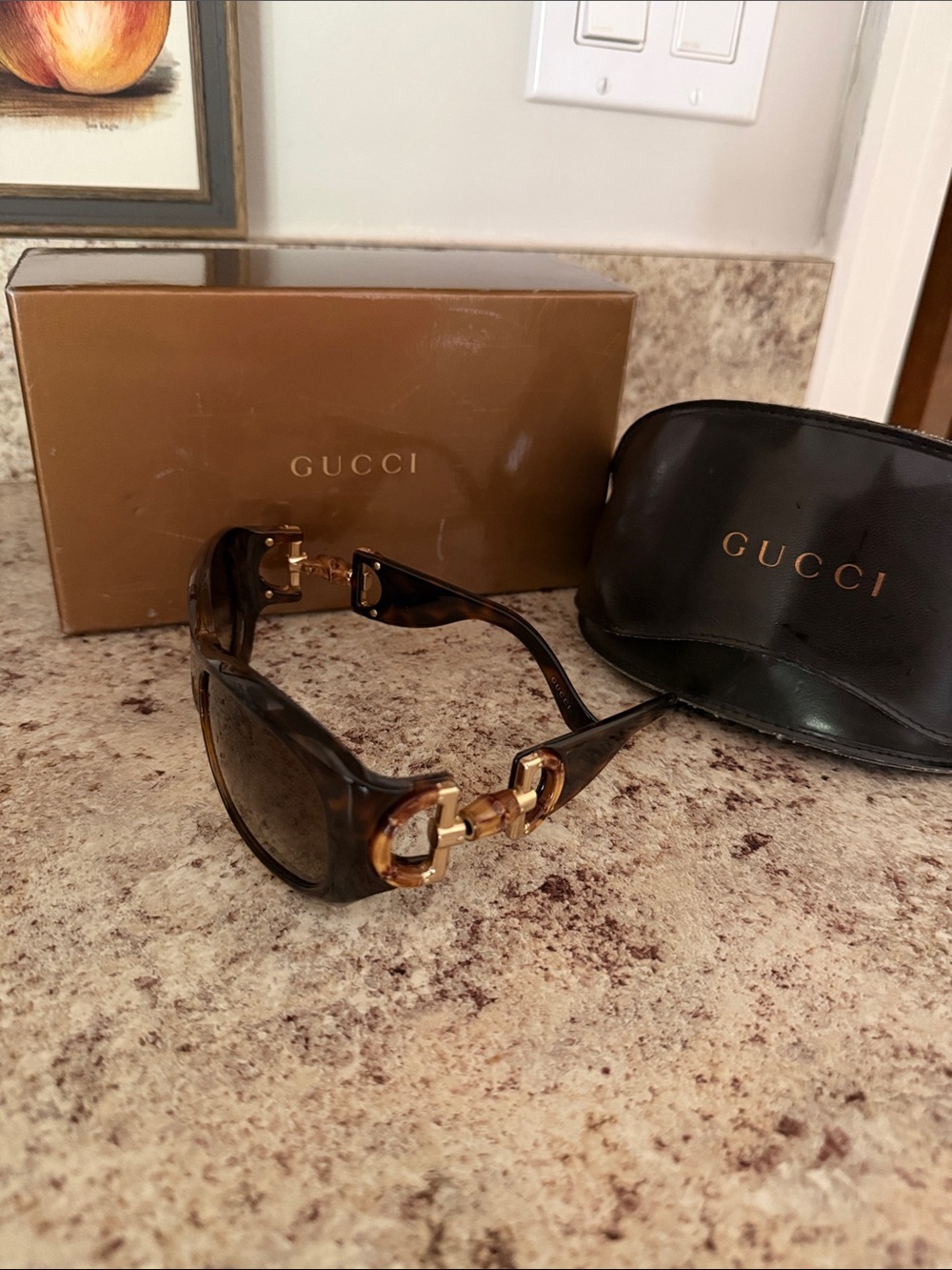 Gucci Women's Brown Tortoise Sunglasses with Gold Accents